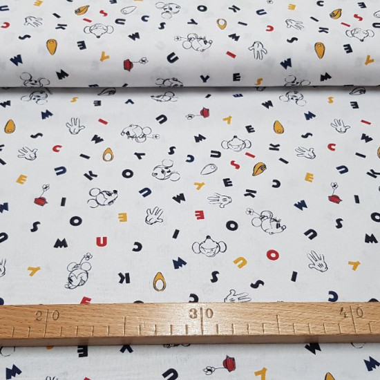 Cotton Disney Mickey Minnie Letters fabric Cotton Disney Mickey Minnie Letters fabric - Disney licensed cotton fabric with drawings of Mickey and Minnie in black and white silhouettes, with colored letters as background. The fabric is 150cm wide and its composition 100% cotton.