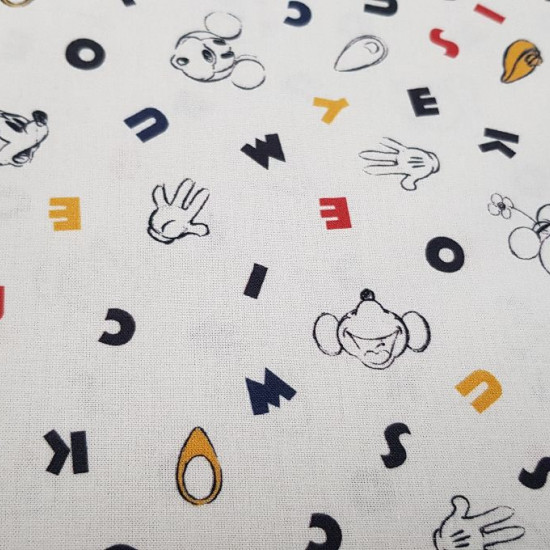 Cotton Disney Mickey Minnie Letters fabric Cotton Disney Mickey Minnie Letters fabric - Disney licensed cotton fabric with drawings of Mickey and Minnie in black and white silhouettes, with colored letters as background. The fabric is 150cm wide and its composition 100% cotton.
