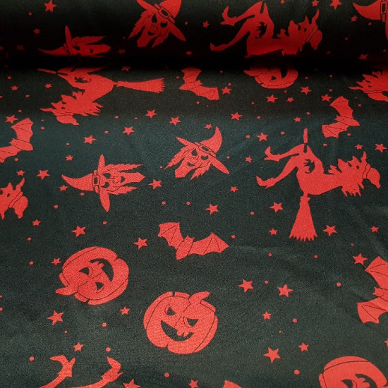 Tela Raso Halloween Tela Raso Halloween - Tejido de raso, brillante por una cara y con bastante caída. Estampado con dibujos de calabazas, brujas y murcielagos rojos sobre fondo negro. Ideal para fiestas de Halloween. La tela mide 150cm de ancho y su composi