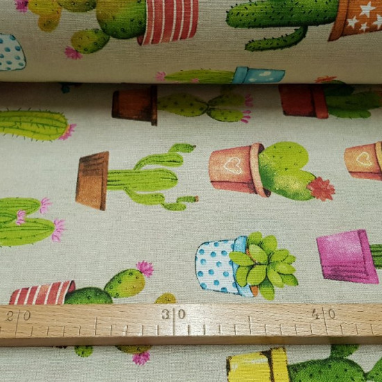 Tela Loneta Cactus Macetas Tela Loneta Cactus Macetas - Tela de loneta fuerte y resistente con dibujos de cactus diferentes en macetas variadas sobre un fondo beige. Para decoración o para confeccionar unos cojines quedará de fábula! La tela de loneta mide 280cm de ancho